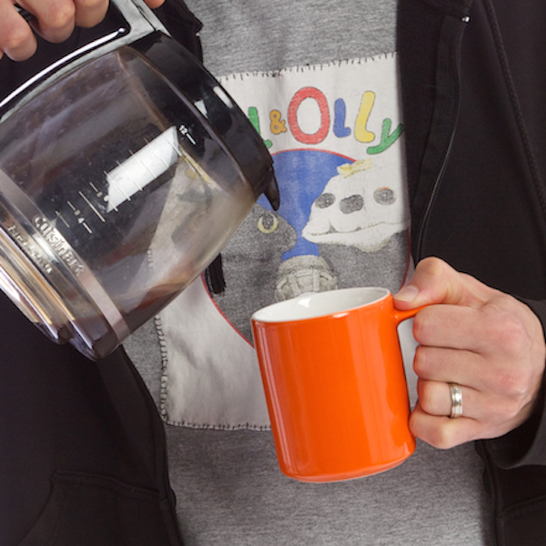 Josh pouring a cup of coffee