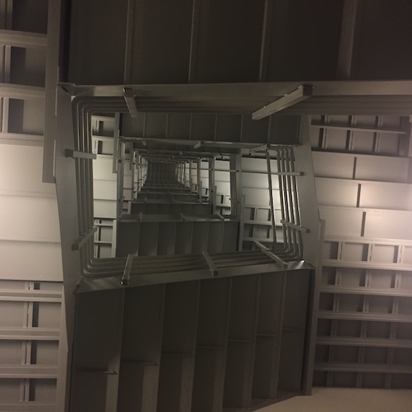 Looking up from the bottom of a long office building stairwell